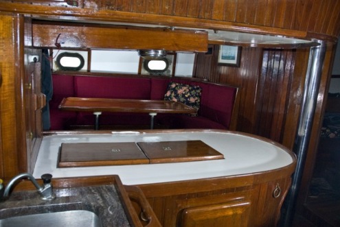 sailboat interior, galley, dining area