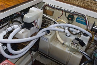 sailboat engine compartment, pumps